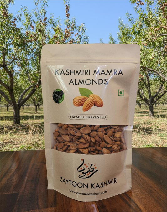 Kashmiri Mamra almonds in a wooden bowl