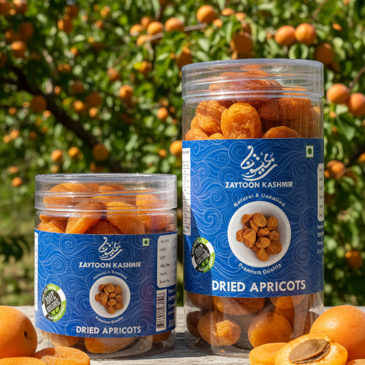 Jars of dried apricots with apricot trees in the background